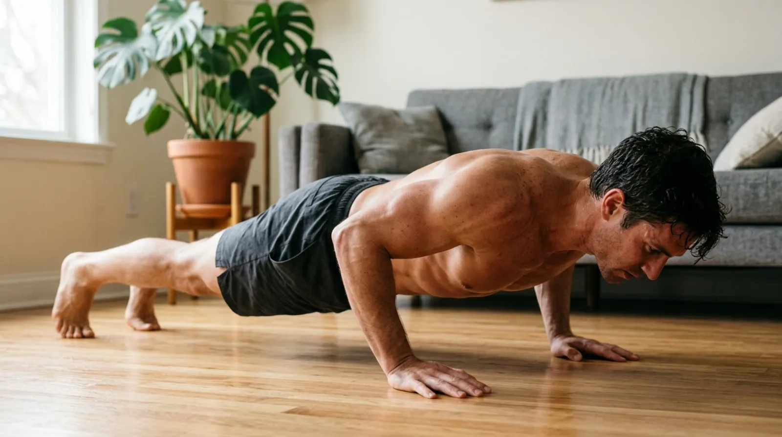 Controlled push-up engaging the chest under tension to build muscle without weights at home