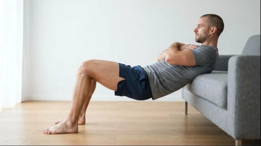 Feet-elevated hip thrust, a top glute exercise at home for building the glutes